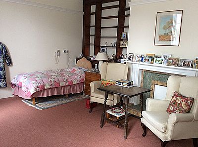 a bedroom at letheringsett hall  residential care home - holt